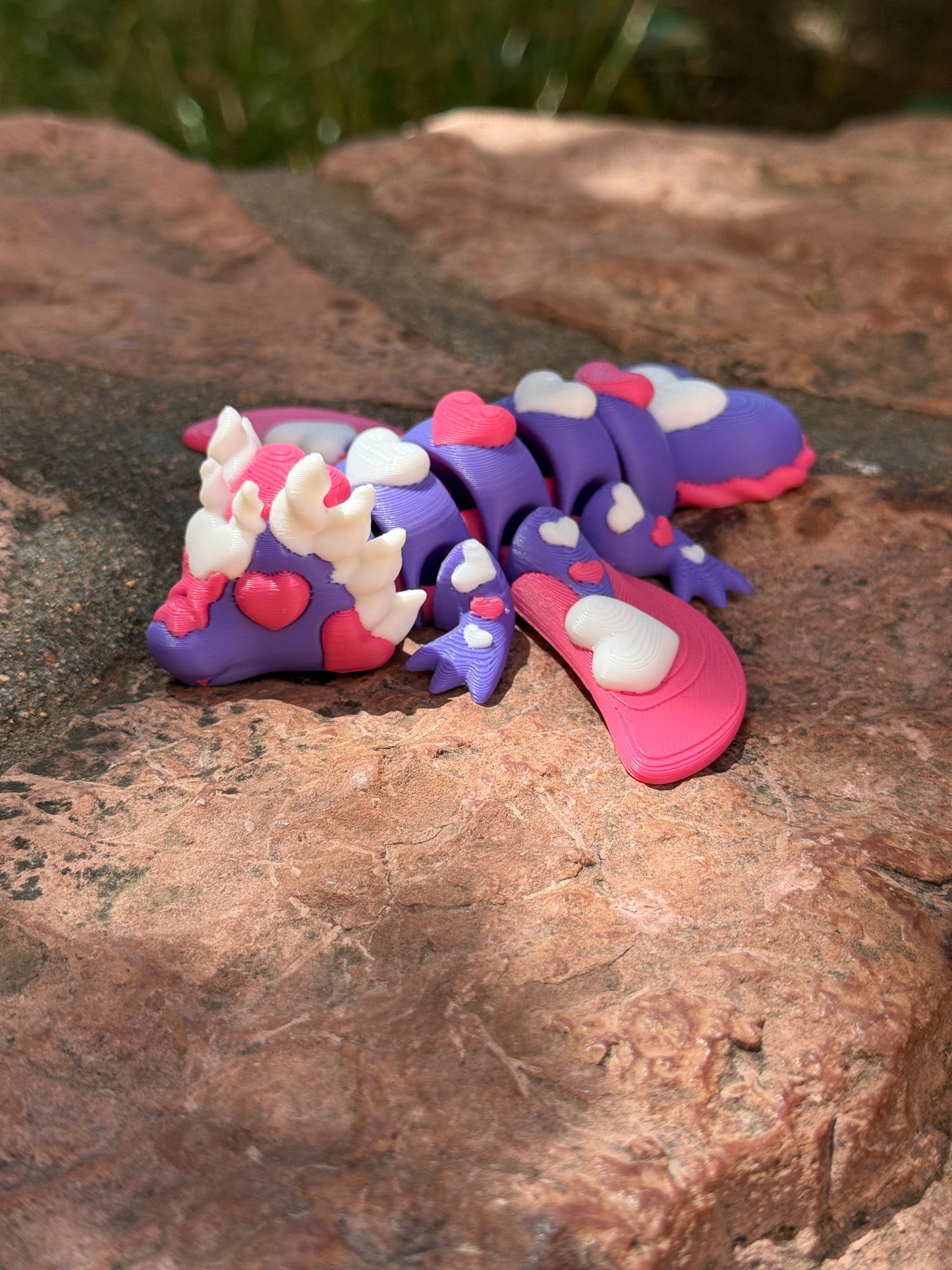 Cute flexi multicolored heart dragon