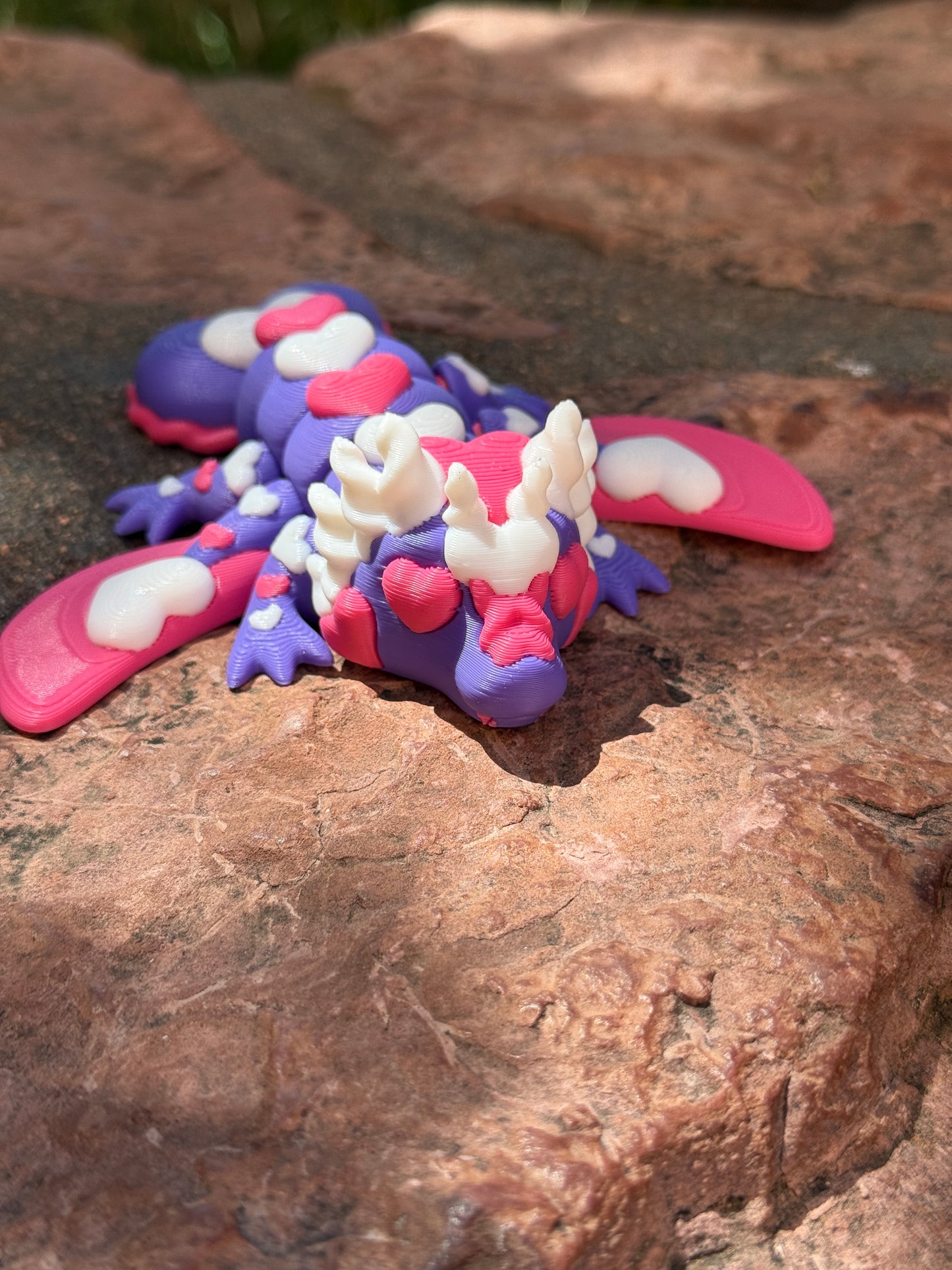 Cute flexi multicolored heart dragon
